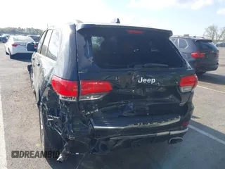 2018 Jeep Grand Cherokee Summit with VIN 1C4RJFJT5JC120523, listed as a IAAI auction lot 42136651 with 75,699 mi miles and . Bid and sale history available at DreamBid. Image 17.
