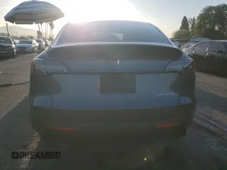 2022 Tesla Model Y Long Range z VIN 7SAYGAEE9NF366382, wystawiony jako Copart lot #52179515 z przebiegiem 41 654 mil mil oraz Szkoda całkowita • Salvage title. Historia ofert i sprzedaży dostępna na DreamBid. Obrazek 6.