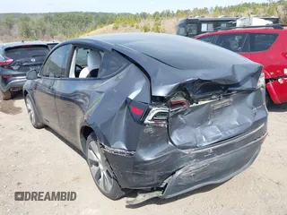 2022 Tesla Model Y Long Range z VIN 7SAYGDEE2NF447998, wystawiony jako IAAI lot #41704968 z przebiegiem 34 088 mil mil oraz . Historia ofert i sprzedaży dostępna na DreamBid. Obrazek 6.