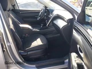 2023 Hyundai Tucson SEL with VIN 5NMJBCAE2PH266771, listed as a IAAI auction lot 41561131 with 34,256 mi miles and . Bid and sale history available at DreamBid. Image 5.