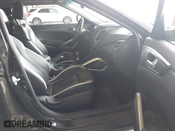 2013 Hyundai Veloster Turbo with VIN KMHTC6AE0DU179068, listed as a IAAI auction lot 42532883 with 182,916 mi miles and . Bid and sale history available at DreamBid. Image 5.