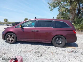 2013 Honda Odyssey Touring with VIN 5FNRL5H96DB037947, listed as a IAAI auction lot 41813910 with 231,920 mi miles. Bid and sale history available at carsss.com. Image 14.
