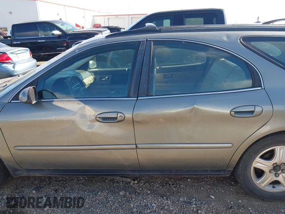 2002 Ford Taurus z VIN 1FAHP59SX2G137396, wystawiony jako IAAI lot #41661425 z przebiegiem 155 789 mil mil oraz . Historia ofert i sprzedaży dostępna na DreamBid. Obrazek 15.