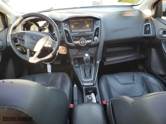 2015 Ford Focus Titanium with VIN 1FADP3N25FL325037, listed as a Copart auction lot 42248985 with 58,831 mi miles and Salvage Title. Bid and sale history available at carsss.com. Image 8.