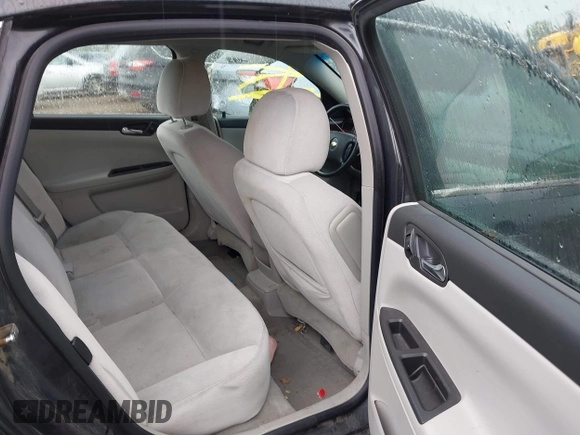 2014 Chevrolet Impala LS with VIN 2G1WA5E38E1110029, listed as a IAAI auction lot 42609288 with 213,861 mi miles and . Bid and sale history available at DreamBid. Image 8.
