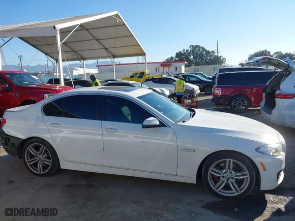 2015 BMW 5 Series 528i with VIN WBA5A5C56FD524971, listed as a IAAI auction lot 41652813 with 102,307 mi miles. Bid and sale history available at carsss.com. Image 14.