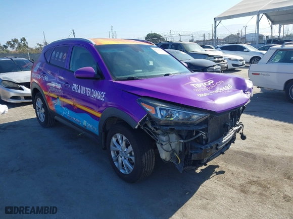 2019 Hyundai Tucson Value with VIN KM8J33A43KU067973, listed as a IAAI auction lot 40122626 with 107,358 mi miles. Bid and sale history available at carsss.com. Image 1.