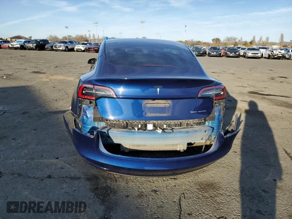 2022 Tesla Model 3 Long Range with VIN 5YJ3E1EB6NF255730, listed as a Copart auction lot 46354235 with 58,470 mi miles and Salvage Title. Bid and sale history available at DreamBid. Image 6.