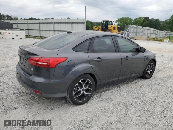 2018 Ford Focus SE z VIN 1FADP3FE1JL220741, wystawiony jako Copart lot #53755735 z przebiegiem Nie podano mil oraz Czysty tytuł • Clean title. Historia ofert i sprzedaży dostępna na DreamBid. Obrazek 3.