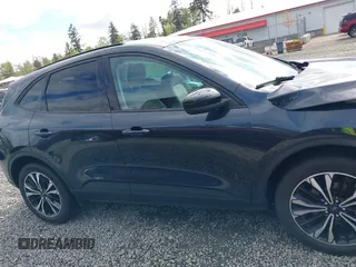 2022 Ford Escape SE Hybrid z VIN 1FMCU9BZ5NUA06681, wystawiony jako IAAI lot #42302156 z przebiegiem 61 582 mil mil oraz . Historia ofert i sprzedaży dostępna na DreamBid. Obrazek 14.