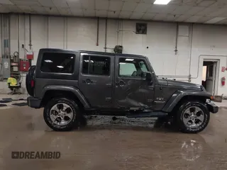 2016 Jeep Wrangler Unlimited Sahara с VIN 1C4BJWEG3GL172532, выставлен на аукционе IAAI как лот 42205994 с пробегом 93 672 миль миль и . История ставок и продаж доступна на DreamBid. Изображение 13.