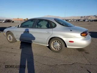 1996 Ford Taurus LX with VIN 1FALP53S9TG173438, listed as a Copart auction lot 77232114 with 89,789 mi miles and Clean title. Bid and sale history available at DreamBid. Image 2.