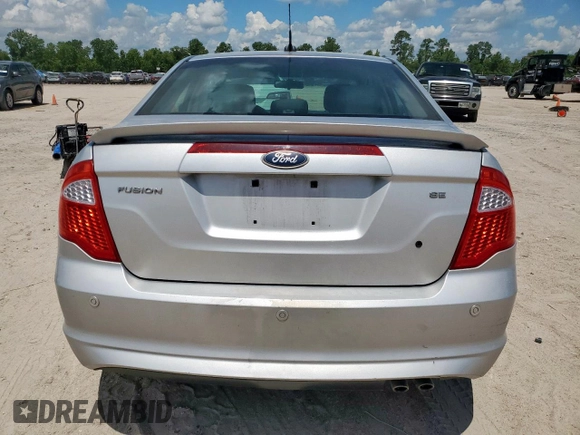 2012 Ford Fusion SE z VIN 3FAHP0HA8CR238183, wystawiony jako Copart lot #62134825 z przebiegiem 173 540 mil mil oraz Szkoda całkowita • Salvage title. Historia ofert i sprzedaży dostępna na DreamBid. Obrazek 6.