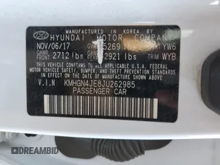 2018 Genesis G80 3.8L with VIN KMHGN4JE8JU262985, listed as a Copart auction lot 71065164 with 69,009 mi miles and Salvage Title. Bid and sale history available at carsss.com. Image 13.