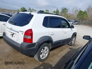 2007 Hyundai Tucson SE with VIN KM8JN12D77U638627, listed as a IAAI auction lot 41551224 with 156,125 mi miles. Bid and sale history available at carsss.com. Image 4.