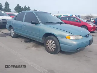 1997 Ford Contour LX with VIN 1FALP6533VK156310, listed as a IAAI auction lot 41567292 with 79,619 mi miles and . Bid and sale history available at DreamBid. Image 1.