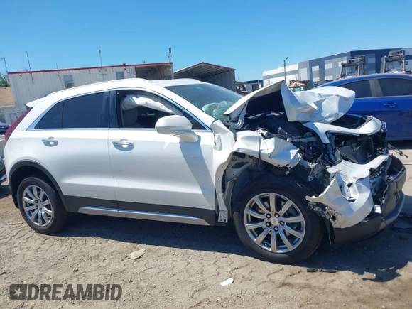 2020 Cadillac XT4 FWD Premium Luxury with VIN 1GYFZCR49LF138493, listed as a IAAI auction lot 41894823 with 49,000 mi miles and . Bid and sale history available at carsss.com. Image 13.