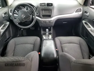 2013 Dodge Journey American Value with VIN 3C4PDCAB6DT577273, listed as a Copart auction lot 50627295 with 139,775 mi miles and Salvage title. Bid and sale history available at DreamBid. Image 8.