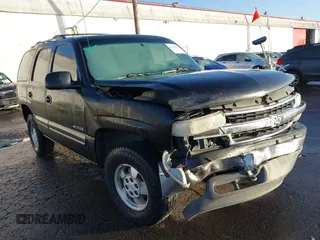 2001 Chevrolet Tahoe LS z VIN 1GNEC13T71R176136, wystawiony jako IAAI lot #41164115 z przebiegiem 168 757 mil mil oraz . Historia ofert i sprzedaży dostępna na DreamBid. Obrazek 1.