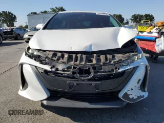 2021 Toyota Prius LE with VIN JTDKAMFP6M3191509, listed as a Copart auction lot 60153785 with 112,625 mi miles and Salvage title. Bid and sale history available at DreamBid. Image 5.