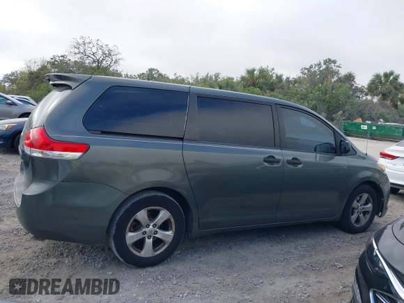 2014 Toyota Sienna L with VIN 5TDZK3DC6ES421278, listed as a IAAI auction lot 41178679 with 202,823 mi miles. Bid and sale history available at carsss.com. Image 13.