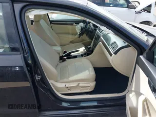2019 Volkswagen Passat 2.0T Wolfsburg Edition with VIN 1VWLA7A34KC012694, listed as a IAAI auction lot 41579392 with 80,846 mi miles. Bid and sale history available at carsss.com. Image 5.