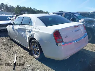 2013 Chrysler 300 with VIN 2C3CCAAG0DH657568, listed as a IAAI auction lot 41319665 with 213,034 mi miles. Bid and sale history available at carsss.com. Image 3.