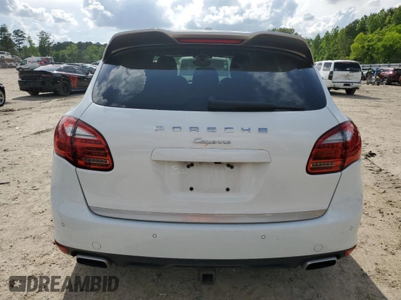 2014 Porsche Cayenne z VIN WP1AA2A2XELA95345, wystawiony jako Copart lot #55649365 z przebiegiem 116 325 mil mil oraz Szkoda całkowita • Salvage title. Historia ofert i sprzedaży dostępna na DreamBid. Obrazek 6.