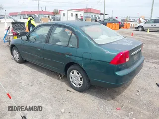 2001 Honda Civic LX with VIN 2HGES16511H546426, listed as a IAAI auction lot 42067246 with 192,560 mi miles. Bid and sale history available at carsss.com. Image 3.
