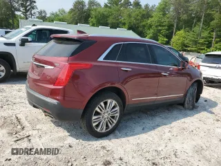 2017 Cadillac XT5 Premium Luxury AWD with VIN 1GYKNERS1HZ112898, listed as a Copart auction lot 58984795 with 140,803 mi miles and Salvage title. Bid and sale history available at DreamBid. Image 3.