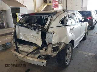 2009 Dodge Caliber SXT with VIN 1B3HB48A89D116734, listed as a IAAI auction lot 41959281 with 209,136 mi miles and . Bid and sale history available at DreamBid. Image 6.