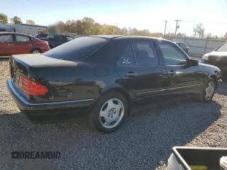 1997 Mercedes-Benz E-Class with VIN WDBJF72F0VA523161, listed as a Copart auction lot 77752804 with 143,495 mi miles and Salvage Title. Bid and sale history available at carsss.com. Image 3.