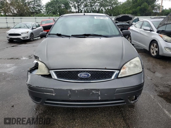 2007 Ford Focus S z VIN 1FAHP34N27W144992, wystawiony jako Copart lot #65571385 z przebiegiem 194 933 mil mil oraz Szkoda całkowita • Salvage title. Historia ofert i sprzedaży dostępna na DreamBid. Obrazek 5.