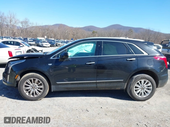 2018 Cadillac XT5 FWD with VIN 1GYKNARS5JZ235585, listed as a IAAI auction lot 41607440 with 77,220 mi miles and . Bid and sale history available at DreamBid. Image 14.