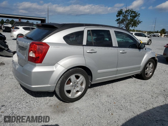 2009 Dodge Caliber SXT with VIN 1B3HB48AX9D157186, listed as a Copart auction lot 52892065 with 218,024 mi miles and Salvage Title. Bid and sale history available at carsss.com. Image 3.