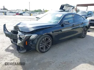 2015 BMW 4 Series 428i z VIN WBA4A9C5XFD416873, wystawiony jako IAAI lot #42108645 z przebiegiem 93 433 mil mil oraz . Historia ofert i sprzedaży dostępna na DreamBid. Obrazek 18.