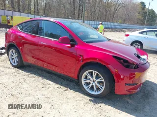 2024 Tesla Model Y Long Range with VIN 7SAYGDEE1RA261338, listed as a IAAI auction lot 41890175 with 14,189 mi miles. Bid and sale history available at carsss.com. Image 1.