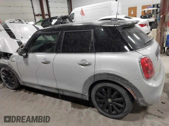 2015 MINI Hardtop 4 Door S with VIN WMWXU3C56F2B66449, listed as a IAAI auction lot 41296784 with 53,589 mi miles and . Bid and sale history available at DreamBid. Image 14.
