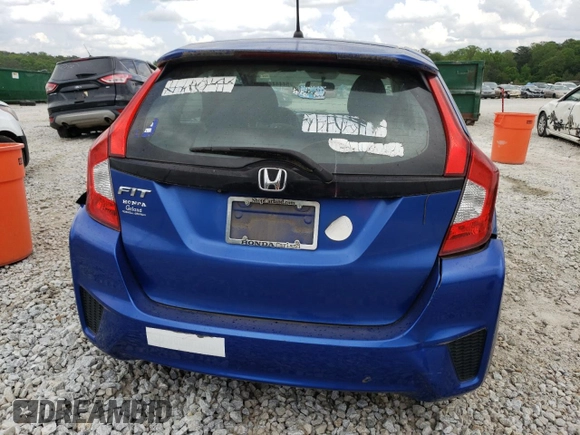 2015 Honda Fit LX with VIN 3HGGK5H57FM766000, listed as a Copart auction lot 54444405 with 65,659 mi miles and Clean Title. Bid and sale history available at carsss.com. Image 6.
