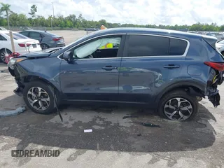 2020 Kia Sportage LX with VIN KNDPM3AC3L7713581, listed as a IAAI auction lot 40255286 with 90,221 mi miles and . Bid and sale history available at carsss.com. Image 13.