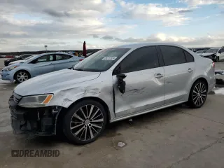 2014 Volkswagen Jetta Sedan S with VIN 3VW2K7AJ0EM311044, listed as a Copart auction lot 85212324 with 128,521 mi miles and Salvage Title. Bid and sale history available at carsss.com. Image 1.