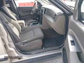 2008 Jeep Grand Cherokee Laredo with VIN 1J8GR48K88C107253, listed as a IAAI auction lot 42018165 with 239,222 mi miles. Bid and sale history available at carsss.com. Image 5.