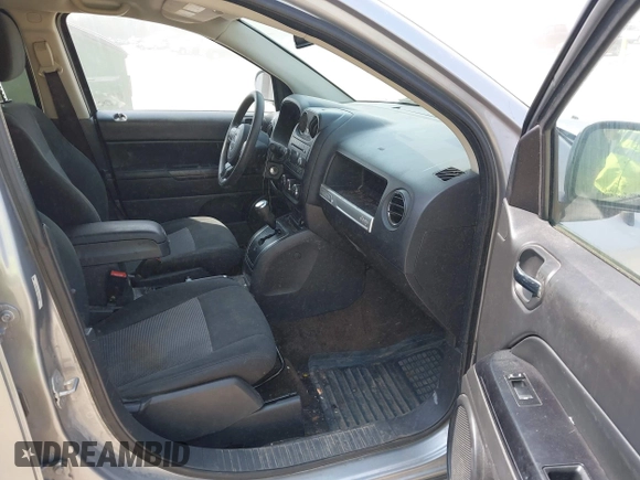 2016 Jeep Compass Sport with VIN 1C4NJDBB1GD566261, listed as a IAAI auction lot 42122853 with 212,060 mi miles. Bid and sale history available at carsss.com. Image 5.