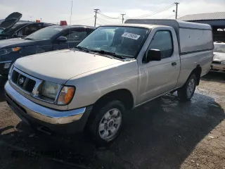 1999 Nissan Frontier XE with VIN 1N6DD21S6XC311441, listed as a Copart auction lot 66729324 with 58,549 mi miles and Salvage title. Bid and sale history available at DreamBid. Image 1.