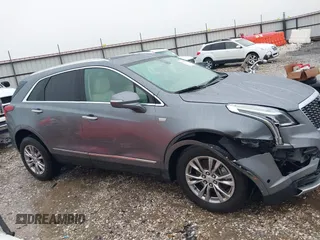 2020 Cadillac XT5 Premium Luxury FWD with VIN 1GYKNCRS2LZ139766, listed as a IAAI auction lot 41949393 with 59,335 mi miles and . Bid and sale history available at carsss.com. Image 13.