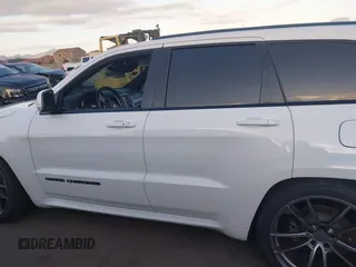 2018 Jeep Grand Cherokee Overland z VIN 1C4RJFCG7JC158464, wystawiony jako IAAI lot #42056386 z przebiegiem 94 608 mil mil oraz . Historia ofert i sprzedaży dostępna na DreamBid. Obrazek 15.