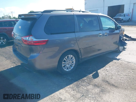 2016 Toyota Sienna XLE with VIN 5TDYK3DC7GS691618, listed as a IAAI auction lot 42496181 with 189,439 mi miles and . Bid and sale history available at DreamBid. Image 4.
