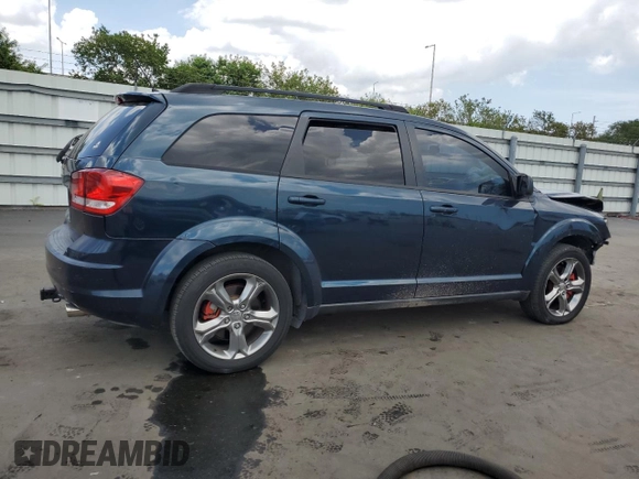 2013 Dodge Journey SE with VIN 3C4PDCAB7DT680055, listed as a Copart auction lot 58241435 with 199,620 mi miles and Salvage title. Bid and sale history available at DreamBid. Image 3.