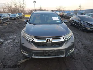 2017 Honda CR-V Touring with VIN 2HKRW2H94HH617081, listed as a IAAI auction lot 41294254 with 145,140 mi miles. Bid and sale history available at carsss.com. Image 12.