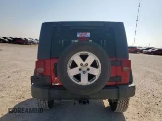 2009 Jeep Wrangler X with VIN 1J4FA24189L776078, listed as a Copart auction lot 57902705 with 104,994 mi miles and Salvage title. Bid and sale history available at DreamBid. Image 6.